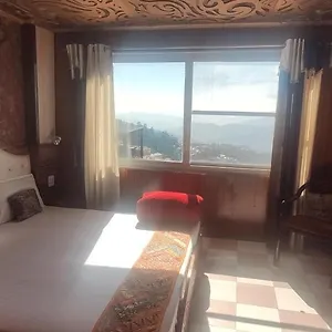 New Malook Hotel,mall Road,near Domino's Pizza Hotel Shimla